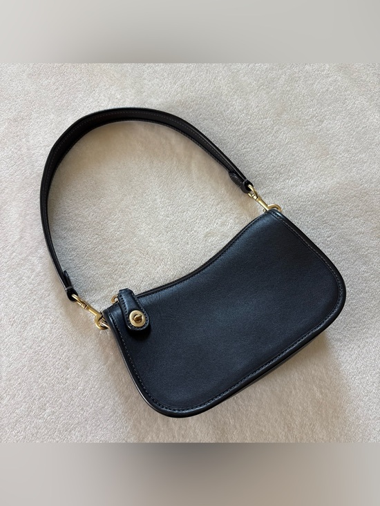 Coach Handbags - Coach Black Swinger Bag with Gold Hardware